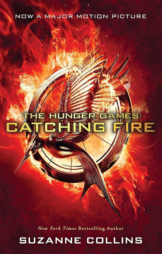 Catching Fire Movie-Tie-in-Edition [Paperback] [Nov 10, 2014] SUZANNE COLLINS cover image